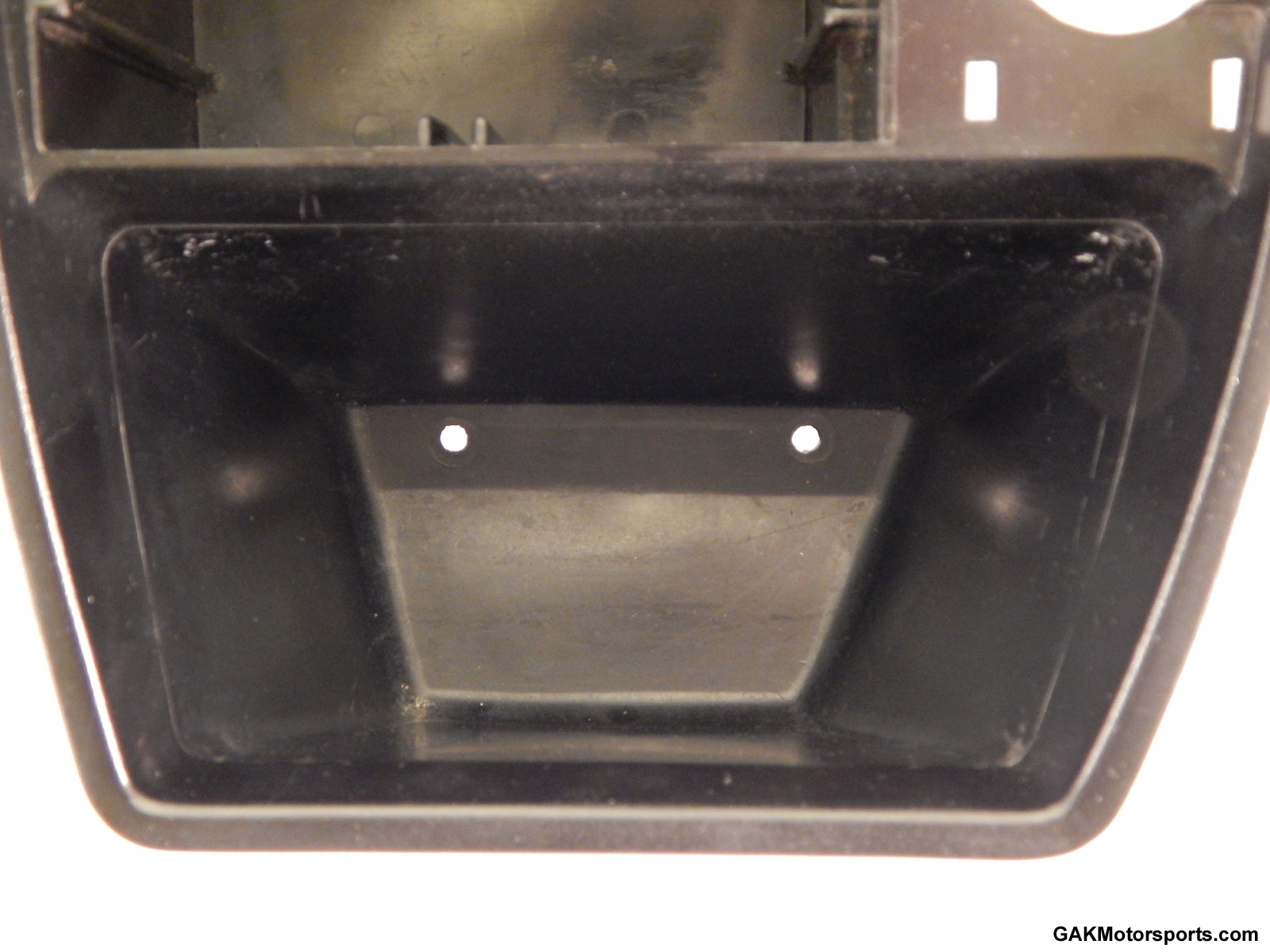 The gauge panel fits approximately where the mold line is inside the console.